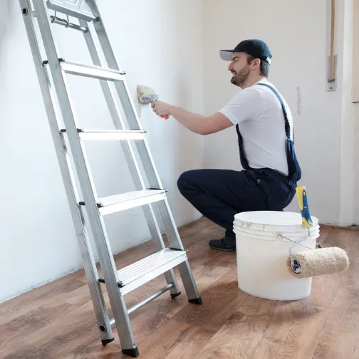 Residential Painter is painting interior of the house