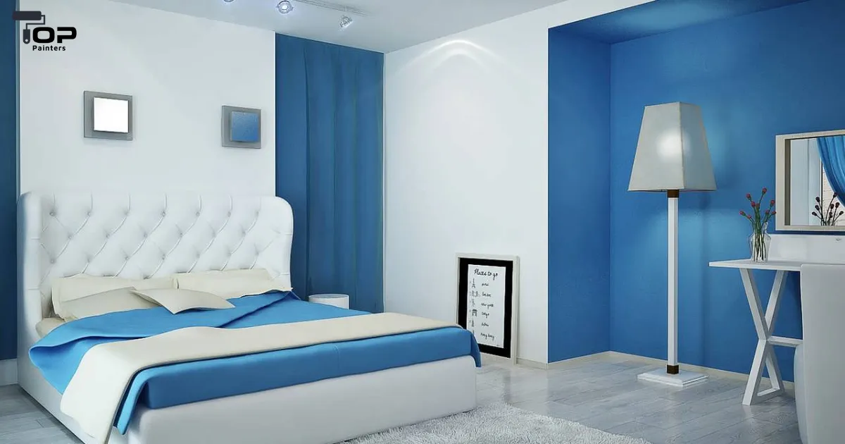 Painting a blue-colored room.